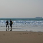 Surfers at Constantine beach, Cornwall
